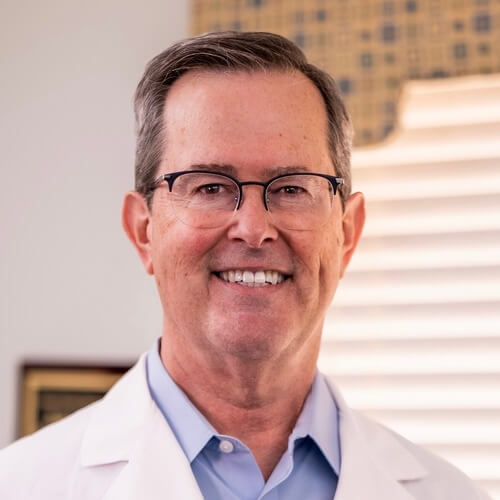 Portrait photo of doctor J. David Sandridge, a dentist in Plano, TX